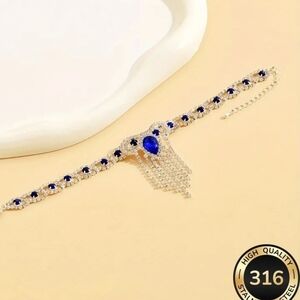 Elegant Silver and Blue Bracelet